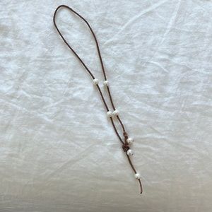 Pearl and brown leather necklace. 17”